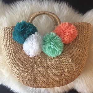 World market small raffia Pom Pom tote